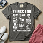 A t-shirt featuring the text THINGS I DO IN MY SPARE TIME AS A NURSING STUDENT surrounded by humorous line-art icons depicting studying, drinking coffee, and lacking sleep.
