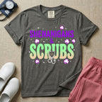 General nursing St. Patrick's Day t-shirt featuring a retro wavy font with the text "SHENANIGANS & SCRUBS" surrounded by shamrock graphics and a stethoscope.