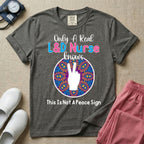 A humorous Labor and Delivery nurse graphic featuring a hand holding up two fingers inside a colorful boho mandala pattern, surrounded by text that reads Only A Real L&D Nurse Knows above and This Is Not A Peace Sign below.