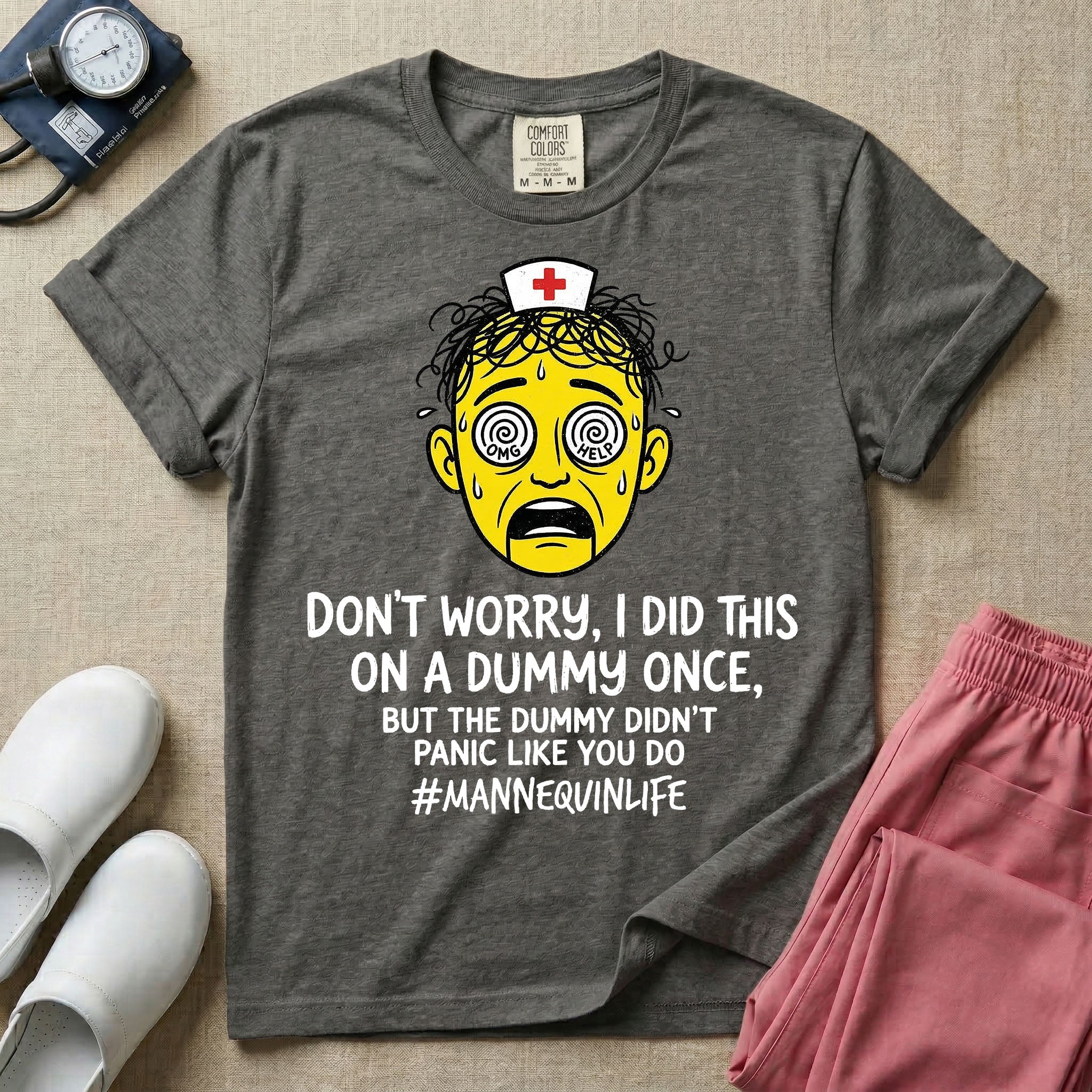 General nursing nurse t-shirt with a funny don't worry I did this on a mannequin once but the dummy didn't panic like you do graphic in pepper color.
