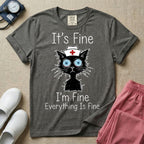 General nursing t-shirt featuring a humorous graphic of a frazzled black cat wearing a medical cross nurse cap alongside the text "It's Fine I'm Fine Everything Is Fine".