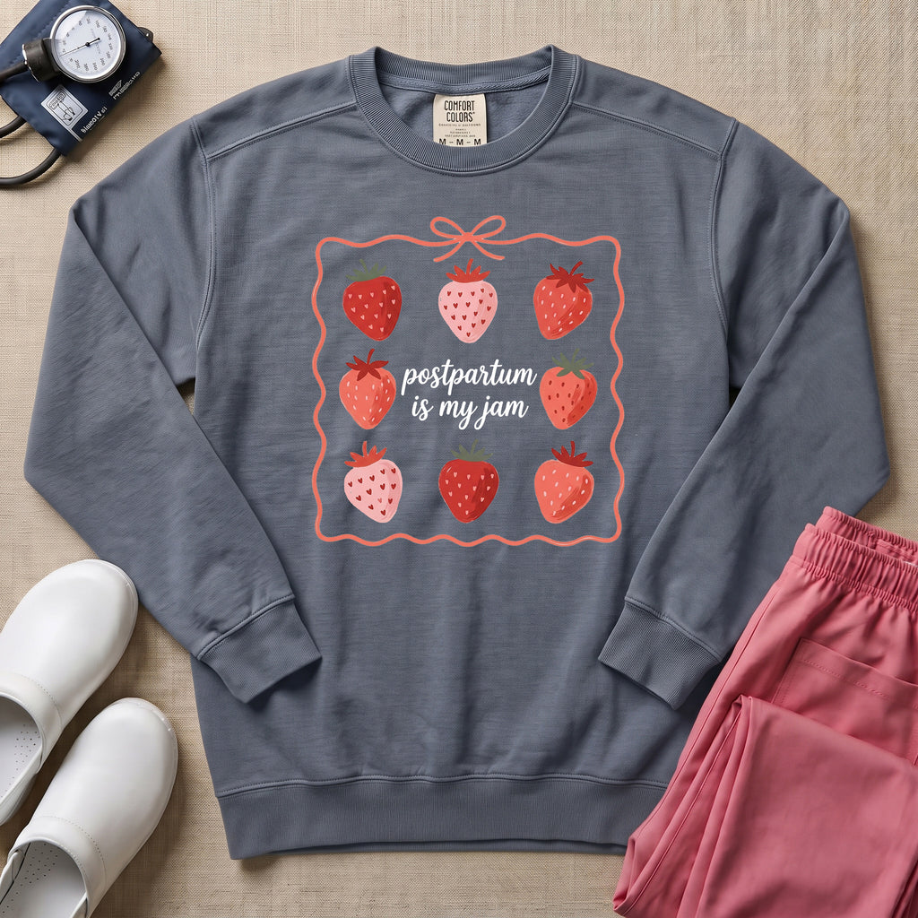 Postpartum Is My Jam Strawberry Coquette Nurse Sweatshirt - Blue Jean Comfort Colors Sweatshirt | HugTee
