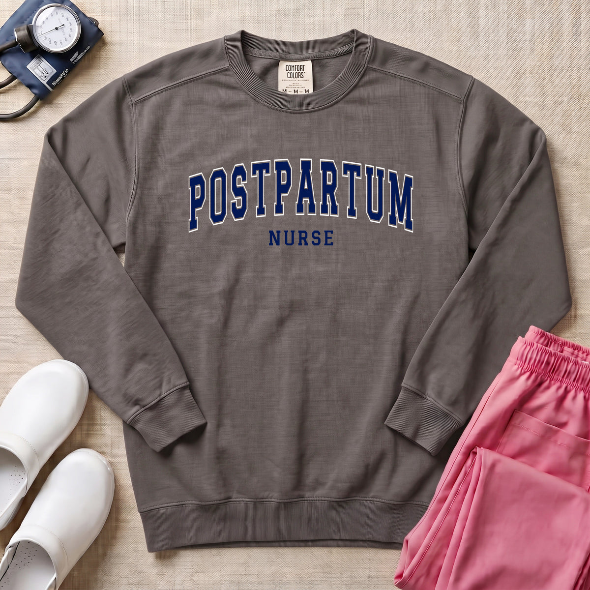 Classic Collegiate Postpartum Nurse Sweatshirt - Pepper Lifestyle Hero Mockup | HugTee