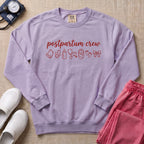 Postpartum Crew Minimalist Icon Nurse Sweatshirt - Orchid Comfort Colors Sweatshirt | HugTee