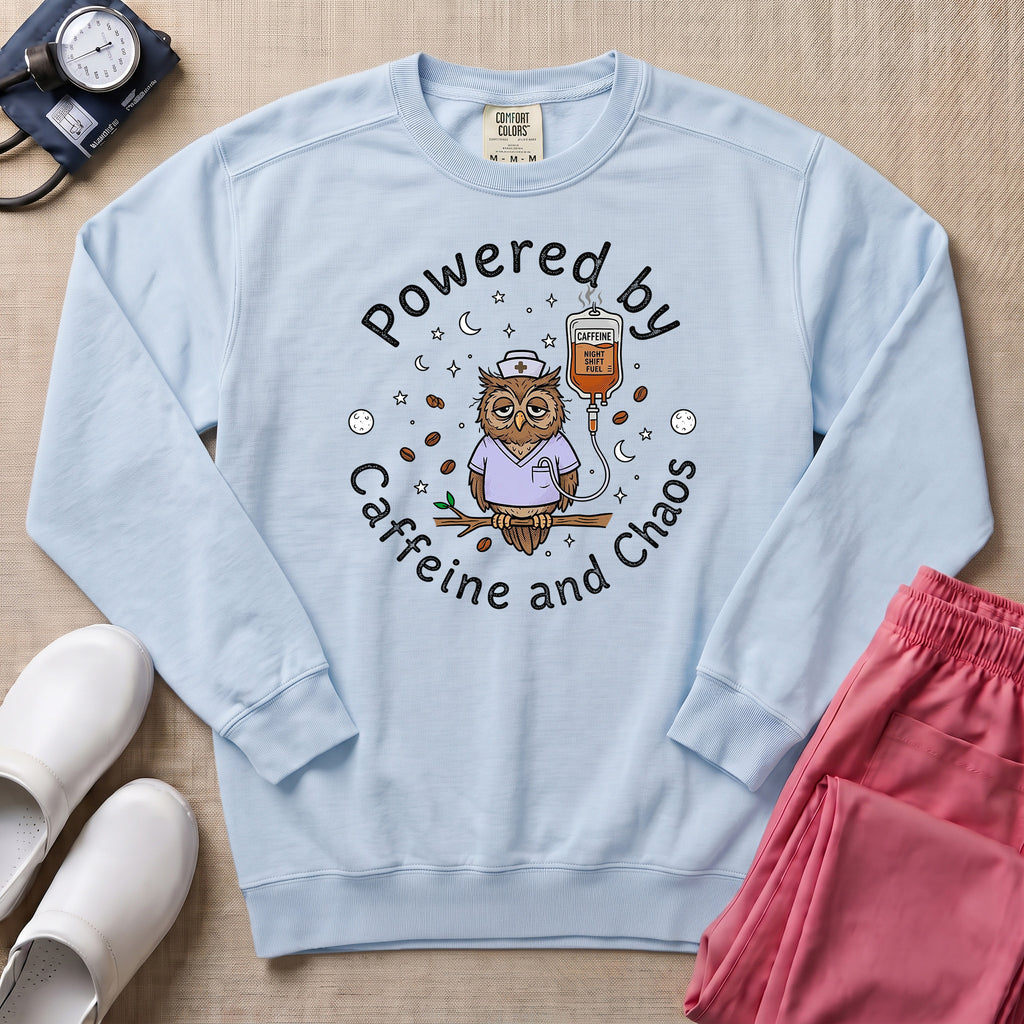 Powered By Caffeine And Chaos Night Shift Nurse Sweatshirt - Chambray Comfort Colors Sweatshirt | HugTee