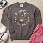 Powered By Caffeine And Chaos Night Shift Nurse Sweatshirt - Pepper Lifestyle Hero Mockup | HugTee