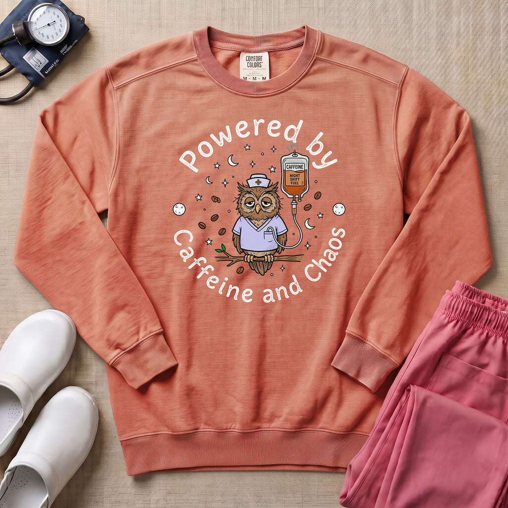 Powered By Caffeine And Chaos Night Shift Nurse Sweatshirt - Terracotta Comfort Colors Sweatshirt | HugTee