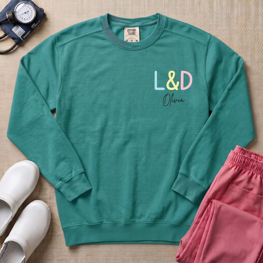Funny Womb Service We Deliver Stork L&D Two-Sided Personalized Sweatshirt - Seafoam Comfort Colors Sweatshirt | HugTee