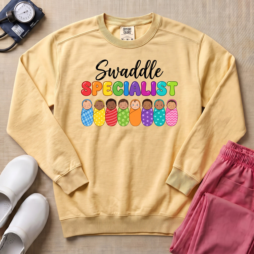 Swaddle Specialist L&D and NICU Nurse Sweatshirt - Butter Comfort Colors Sweatshirt | HugTee