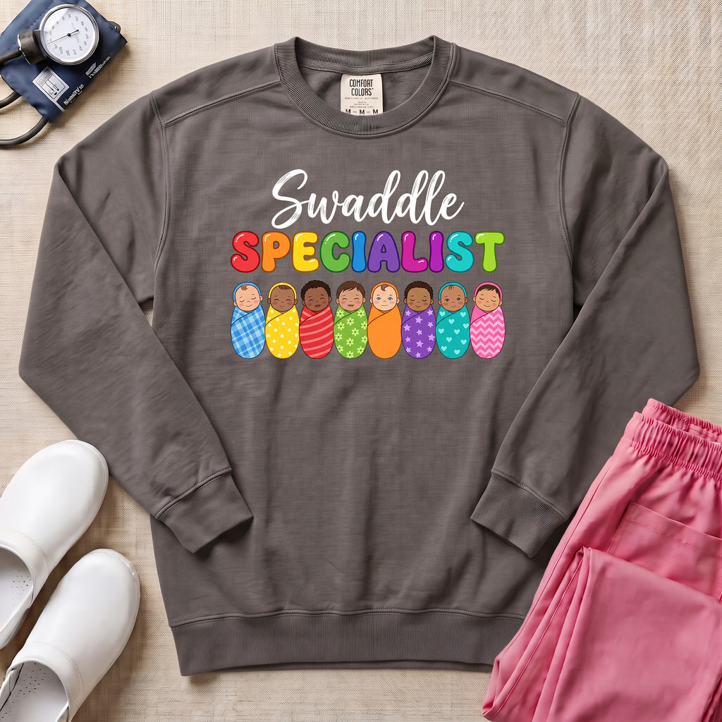 Swaddle Specialist L&D and NICU Nurse Sweatshirt - Pepper Lifestyle Hero Mockup | HugTee