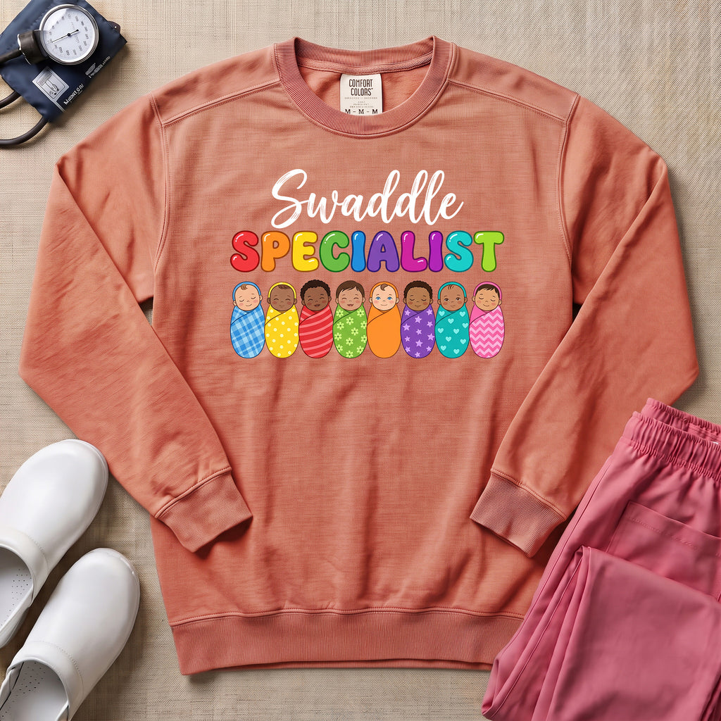 Swaddle Specialist L&D and NICU Nurse Sweatshirt - Terracotta Comfort Colors Sweatshirt | HugTee
