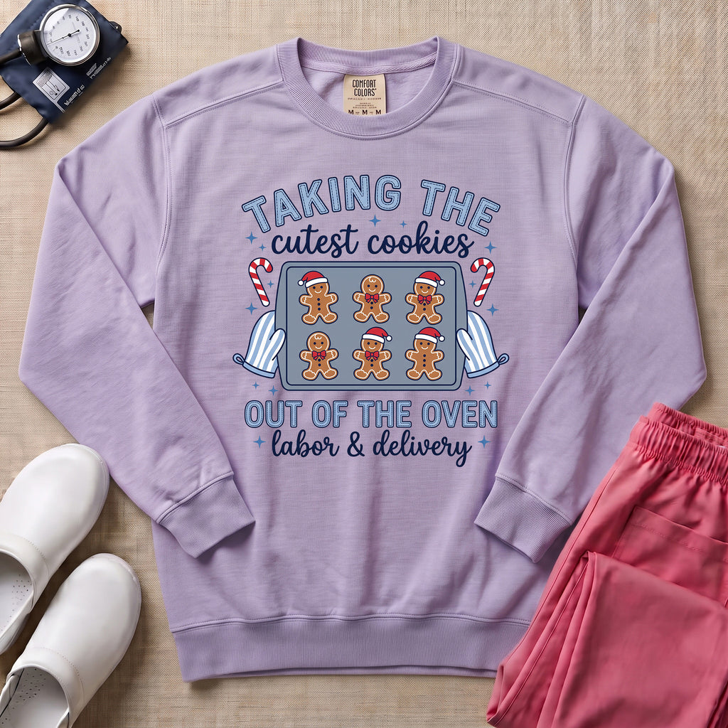 Taking The Cutest Cookies Out Of The Oven Labor and Delivery Christmas Nurse Sweatshirt - Orchid Comfort Colors Sweatshirt | HugTee