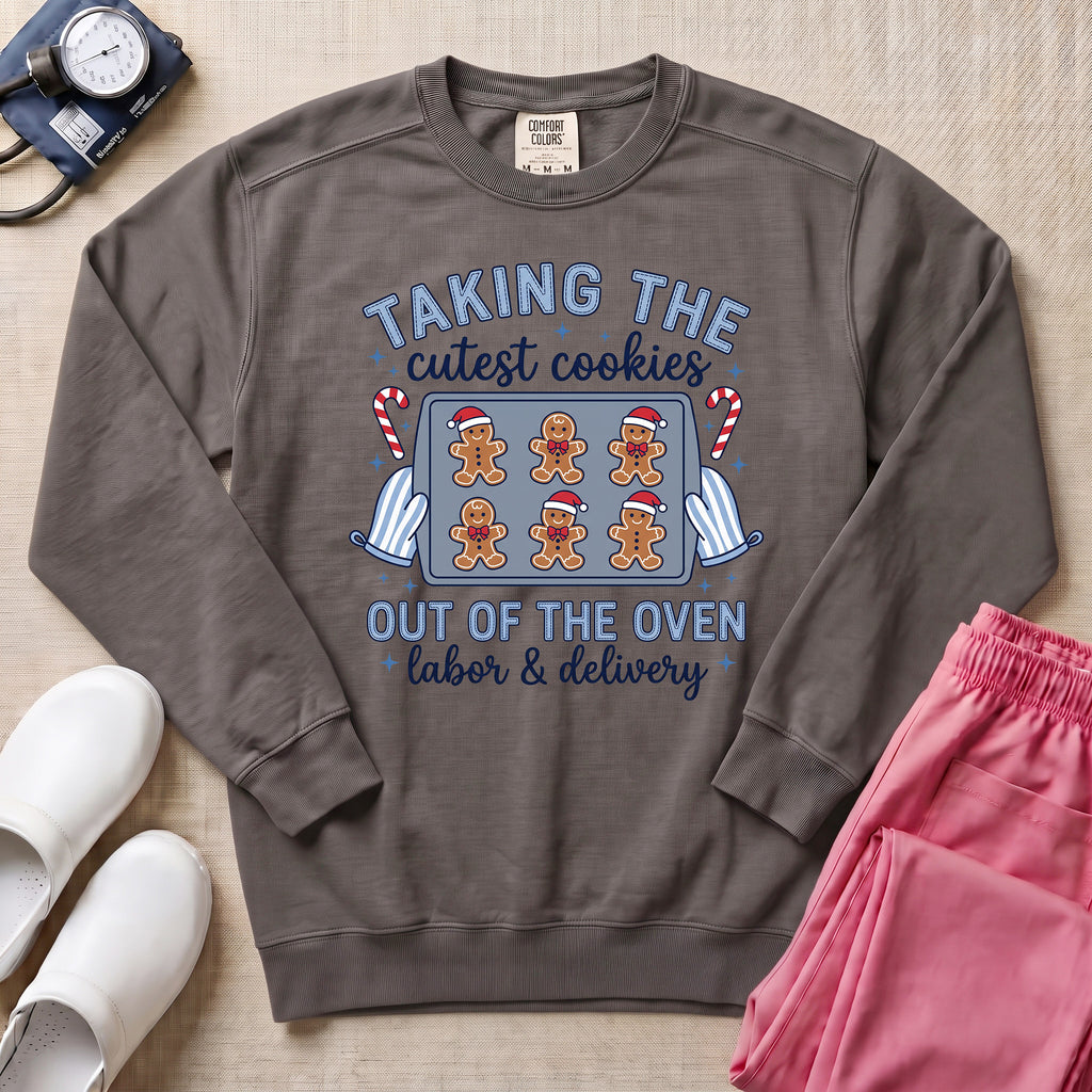 Taking The Cutest Cookies Out Of The Oven Labor and Delivery Christmas Nurse Sweatshirt - Pepper Lifestyle Hero Mockup | HugTee
