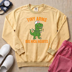 Tiny Arms Big NICU Hearts Funny T-Rex Nurse Sweatshirt - Butter Comfort Colors Sweatshirt | HugTee