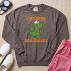 Tiny Arms Big NICU Hearts Funny T-Rex Nurse Sweatshirt - Pepper Lifestyle Hero Mockup | HugTee