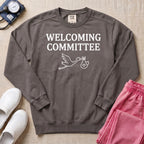 Welcoming Committee Stork Sweatshirt - Pepper Lifestyle Hero Mockup | HugTee
